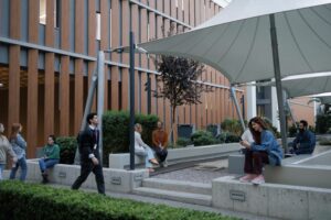 7-people-at-the-outdoor-break-area-in-Teleperformance-multilingual-hub-in-pireas